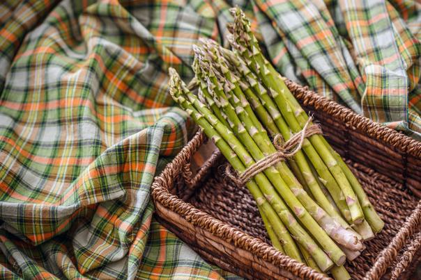 green asparagus in basket