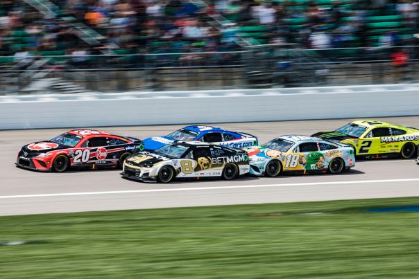 Cars race on the track at Kansas speedway