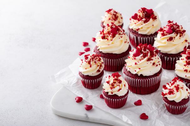 nice red velvet cupcake sitting on white background